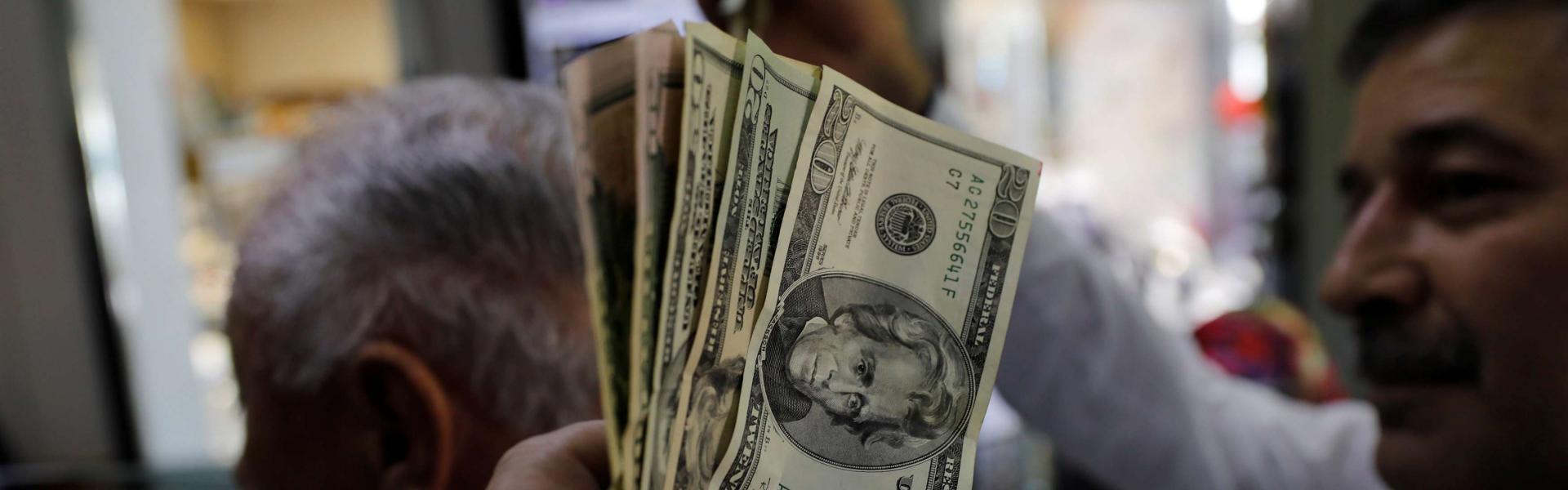 Turks buy dollars after lira rally 1