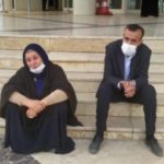Mother and son stage sit-in protest for just trial in political murder case 2