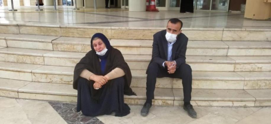 Mother and son stage sit-in protest for just trial in political murder case 1