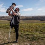 Flying high: how a photo of a Syrian father and son led to a new life in Italy 3