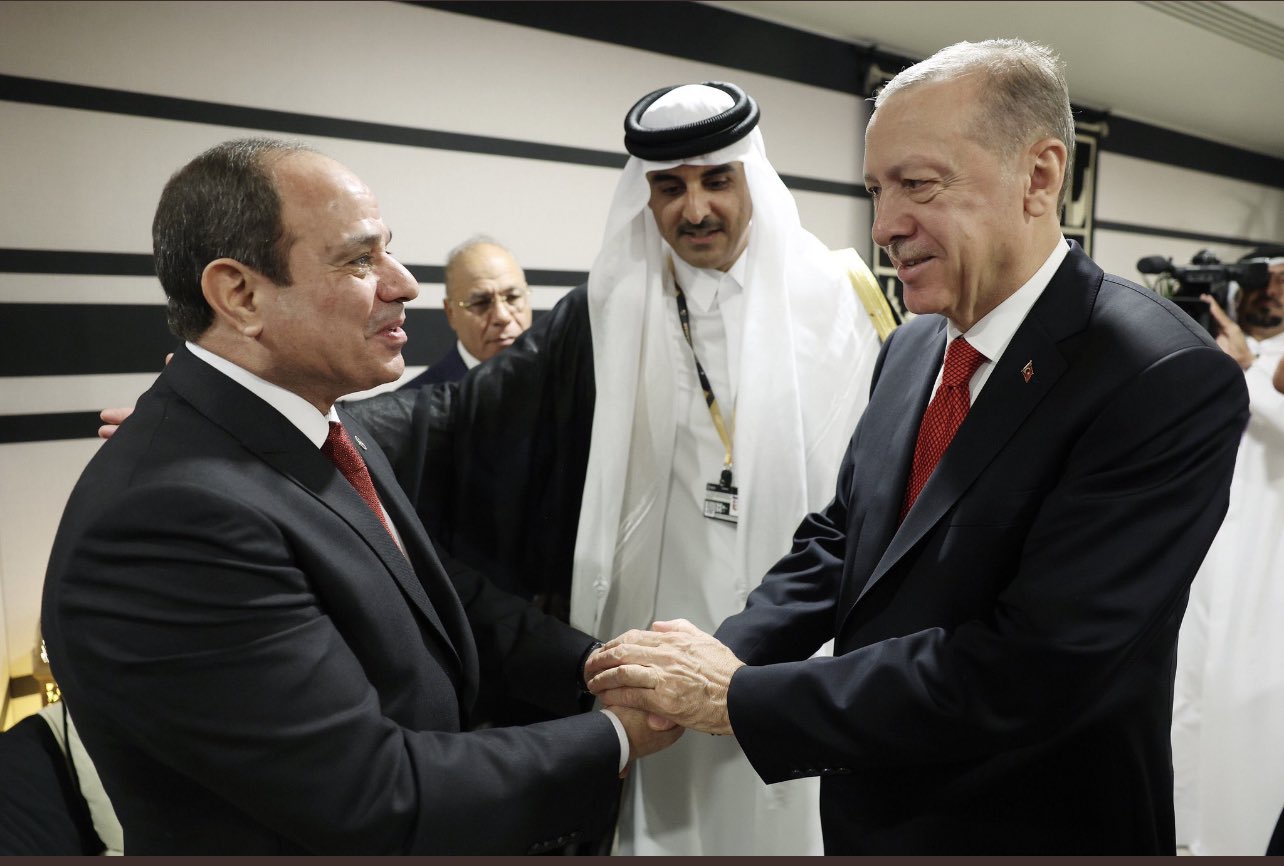 Turkey’s Erdogan shakes hands with Egypt’s Sisi at World Cup 23