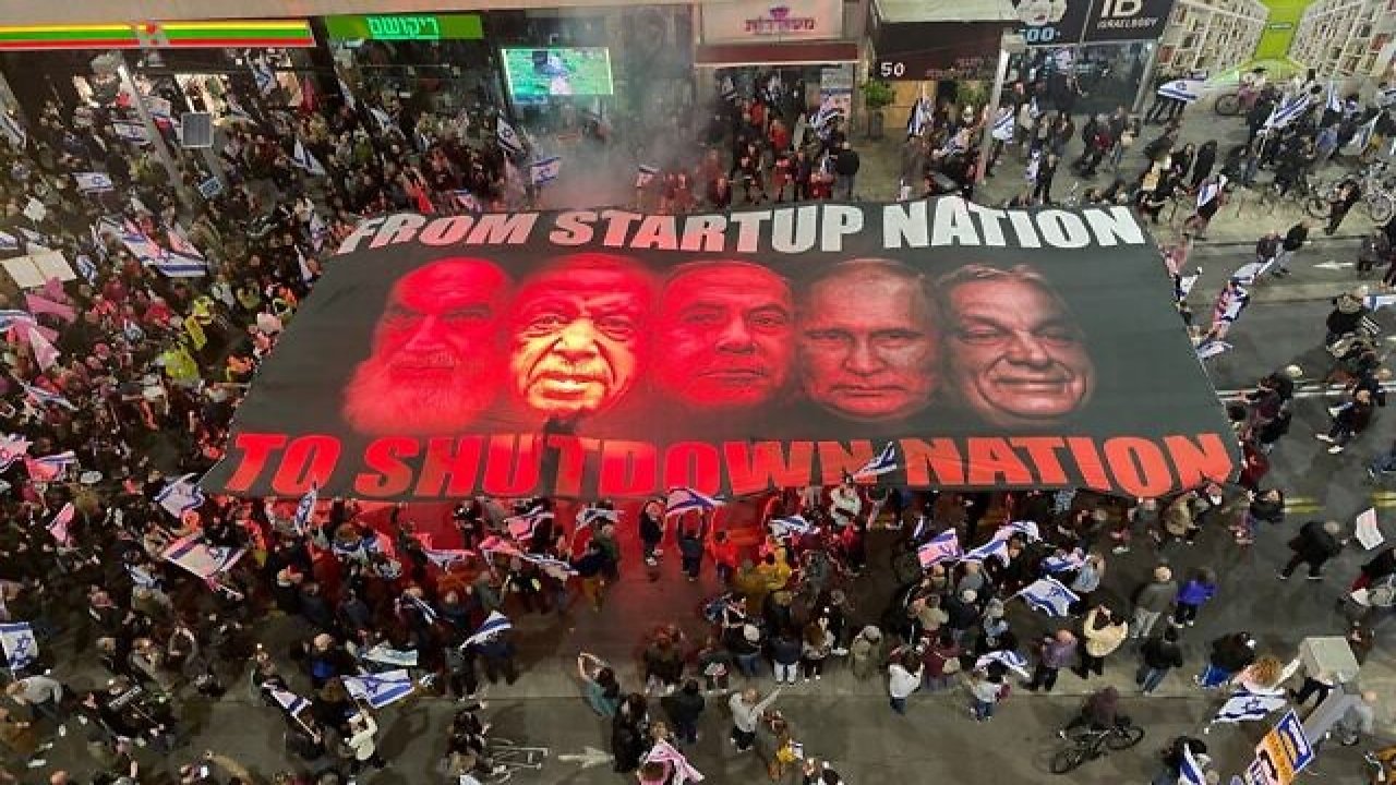 Turkey's Erdoğan among five repressive figures on banner at Tel Aviv protest 1